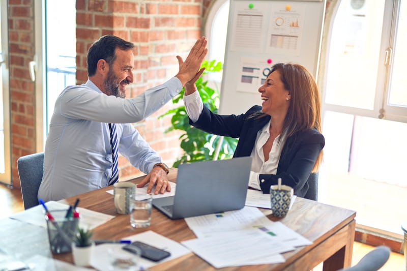 Happy business owner with BrilliantFixCalls